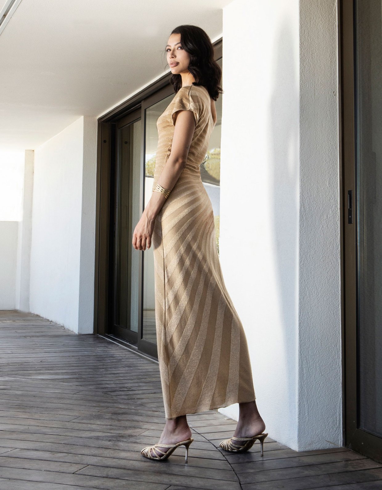 Aggel Knitwear One shoulder lurex knit maxi dress tan gold