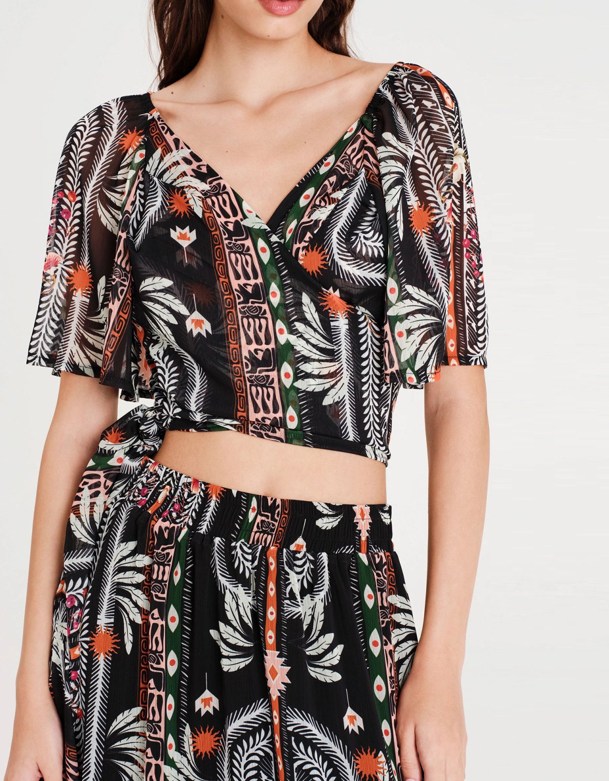 Peace and Chaos Myrtle wrap crop top