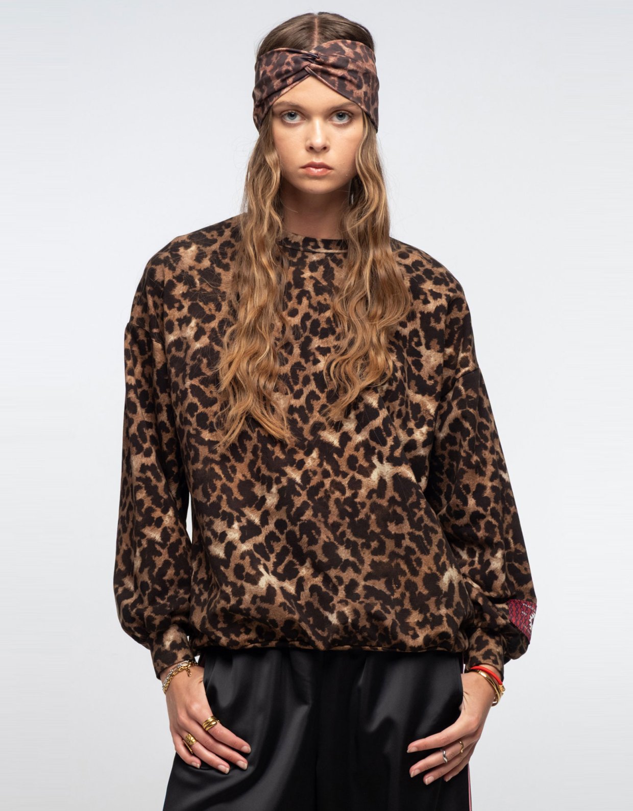 Peace and Chaos Rosette sweater top