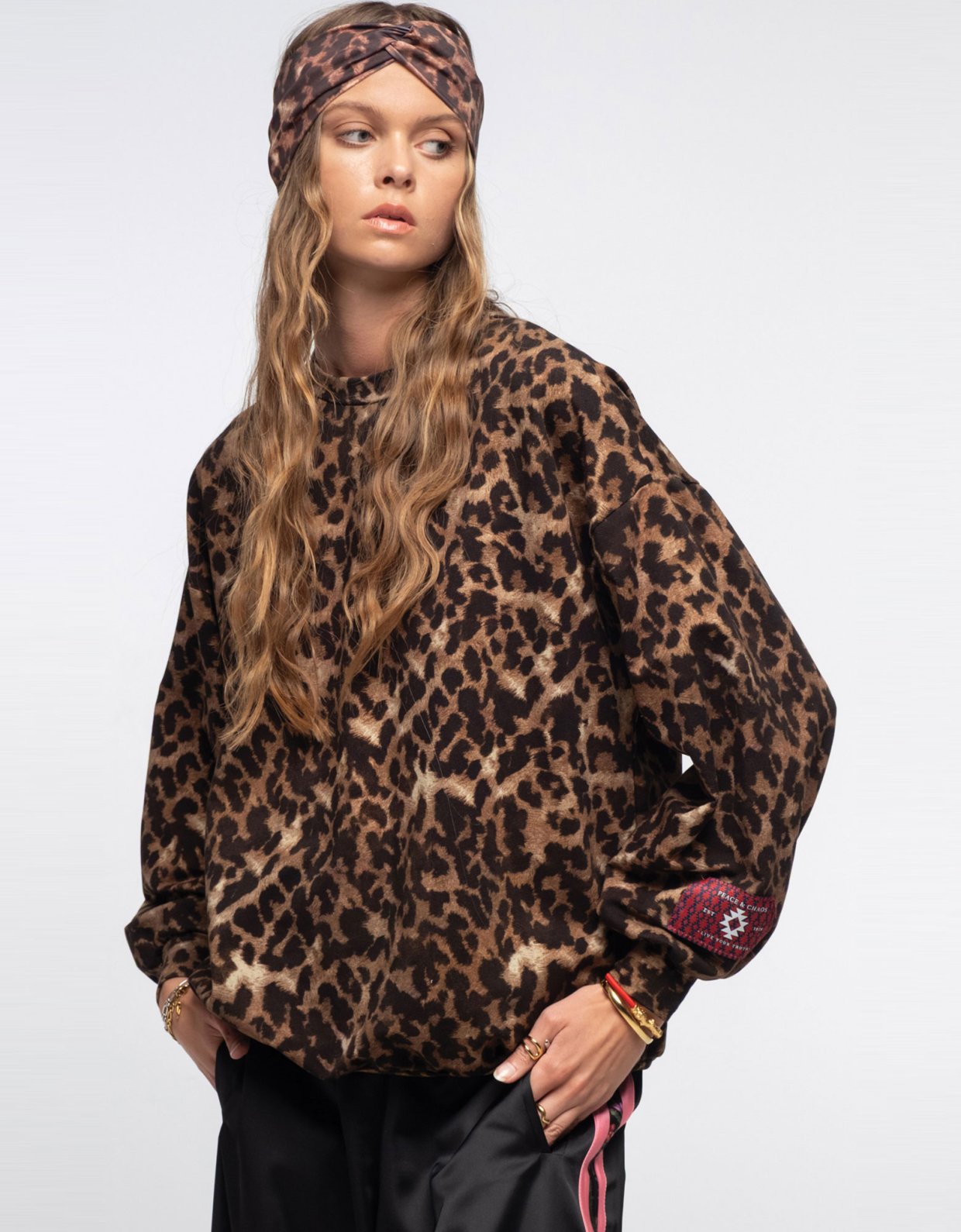 Peace and Chaos Rosette sweater top