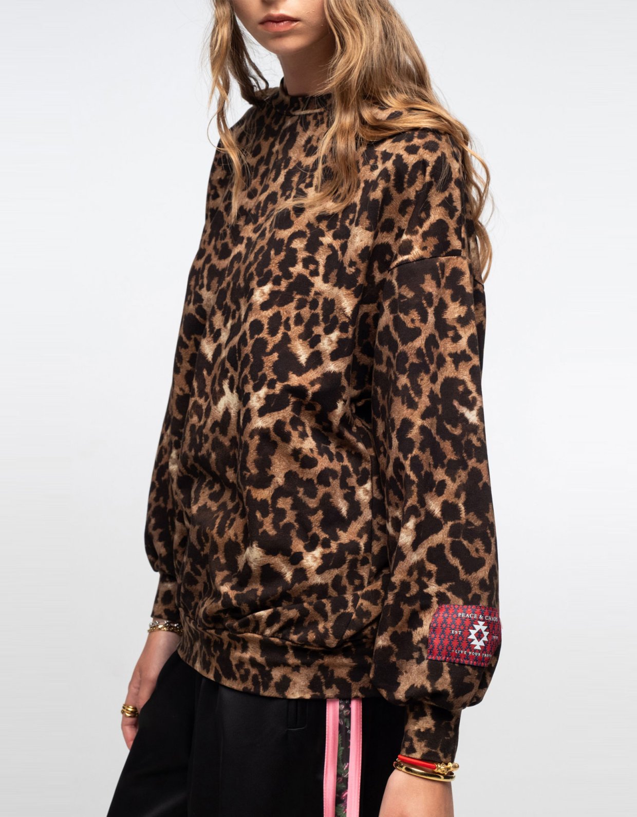 Peace and Chaos Rosette sweater top