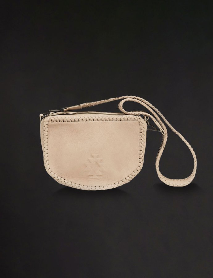 The karma crossbody saddle bag sand